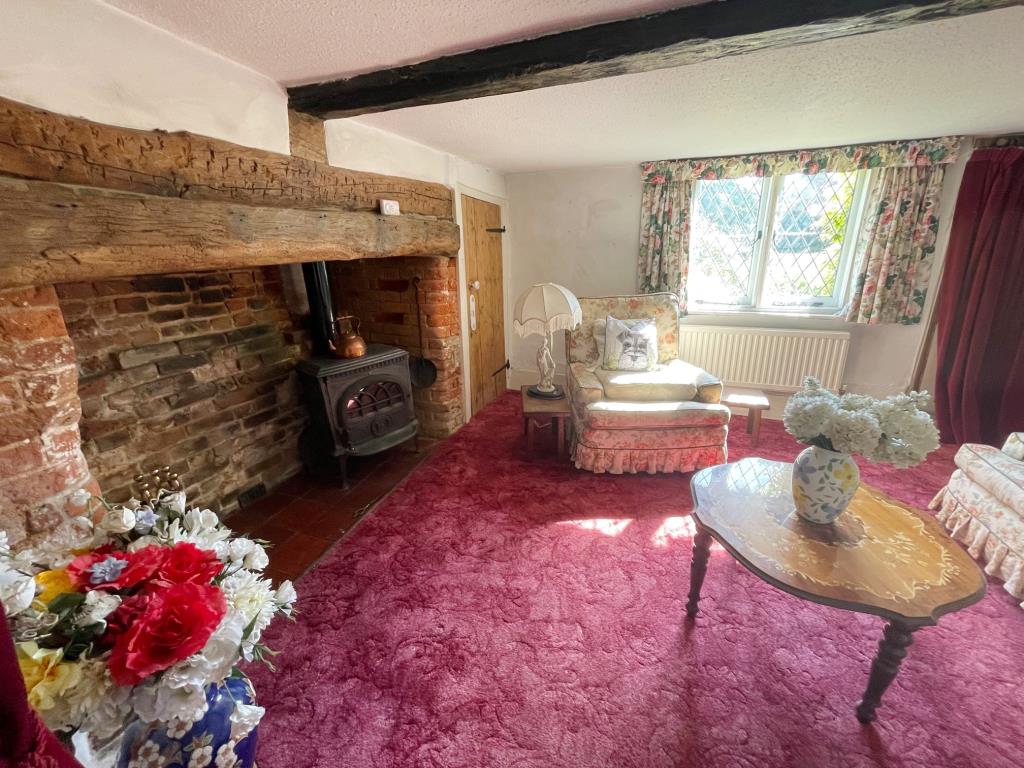 Lot: 36 - DETACHED TWO-BEDROOM COTTAGE IN POPULAR RESIDENTIAL LOCATION - Living Room with inglenook fireplace